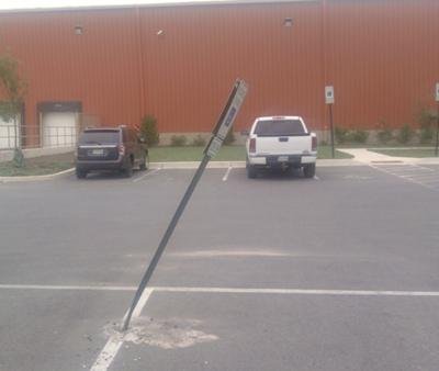 Damage from bent sign post fault 21391381 Damage from bent sign post fault 21391381