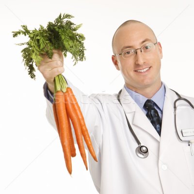 13146 stock photo doctor holding carrots