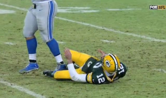 Rodgers Suh ankle lions packers