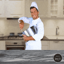 A man in a chef s uniform is pouring something into a pot in a kitchen7896448387091634924
